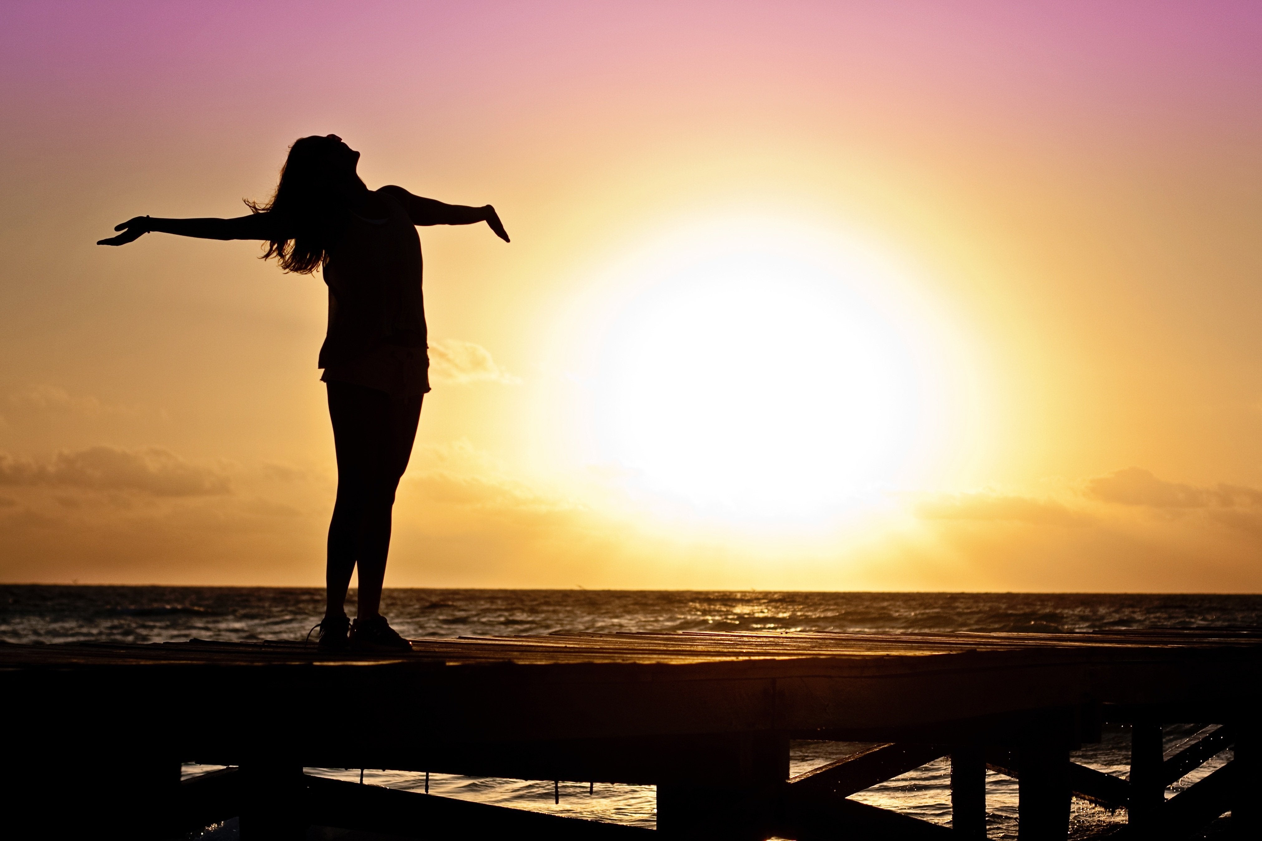 woman freedom happy sunset